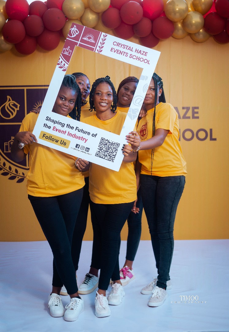 three students in yellow school attire